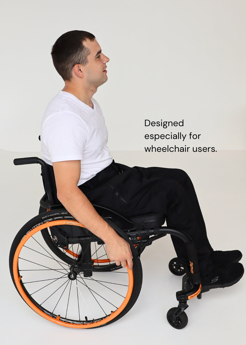 Black pants without pockets, wheelchair adapted