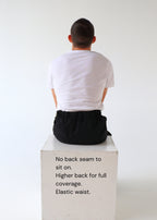 Black pants without pockets, wheelchair adapted