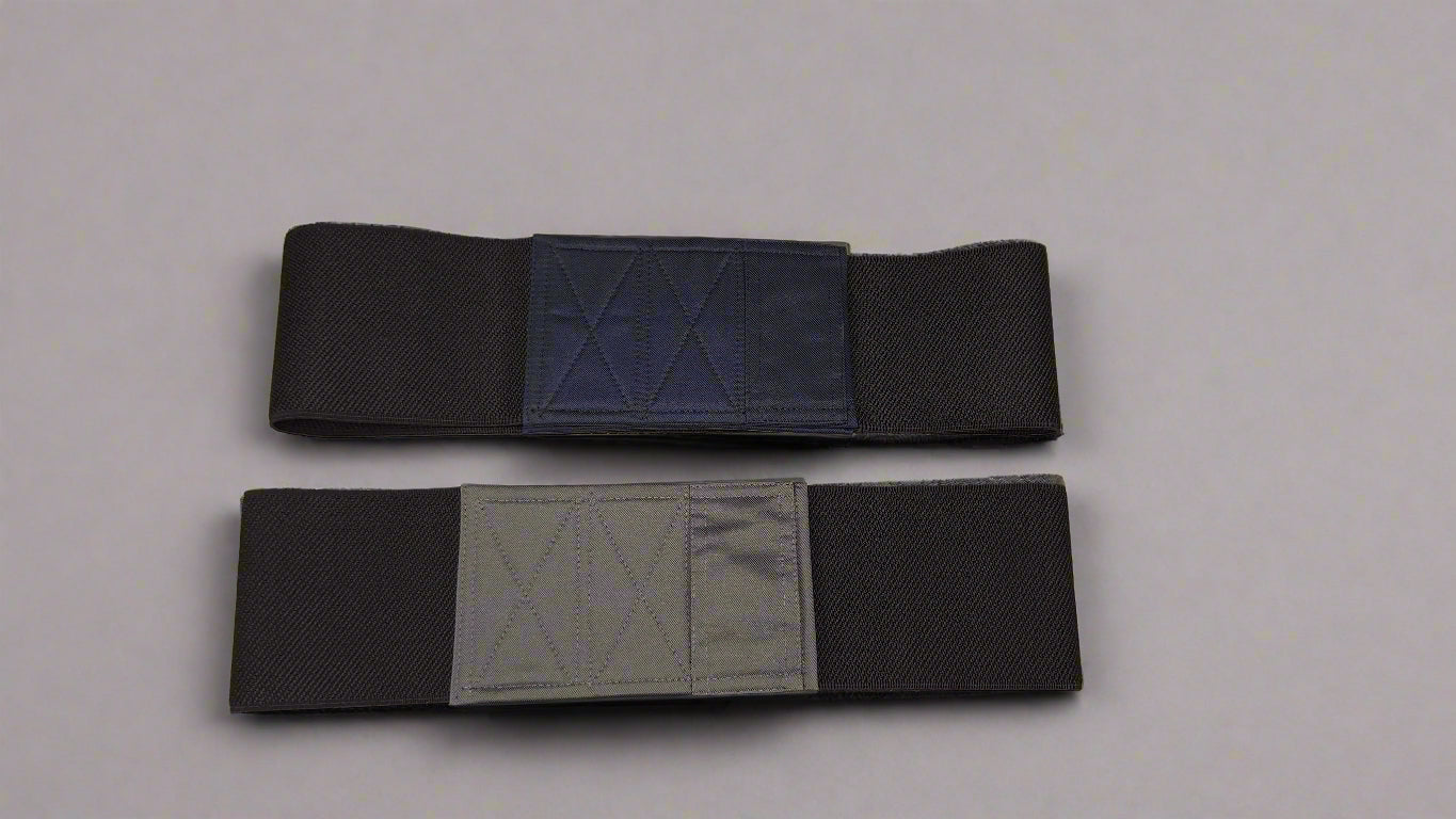 Wide elastic strap for keeping legs together for wheelchair users