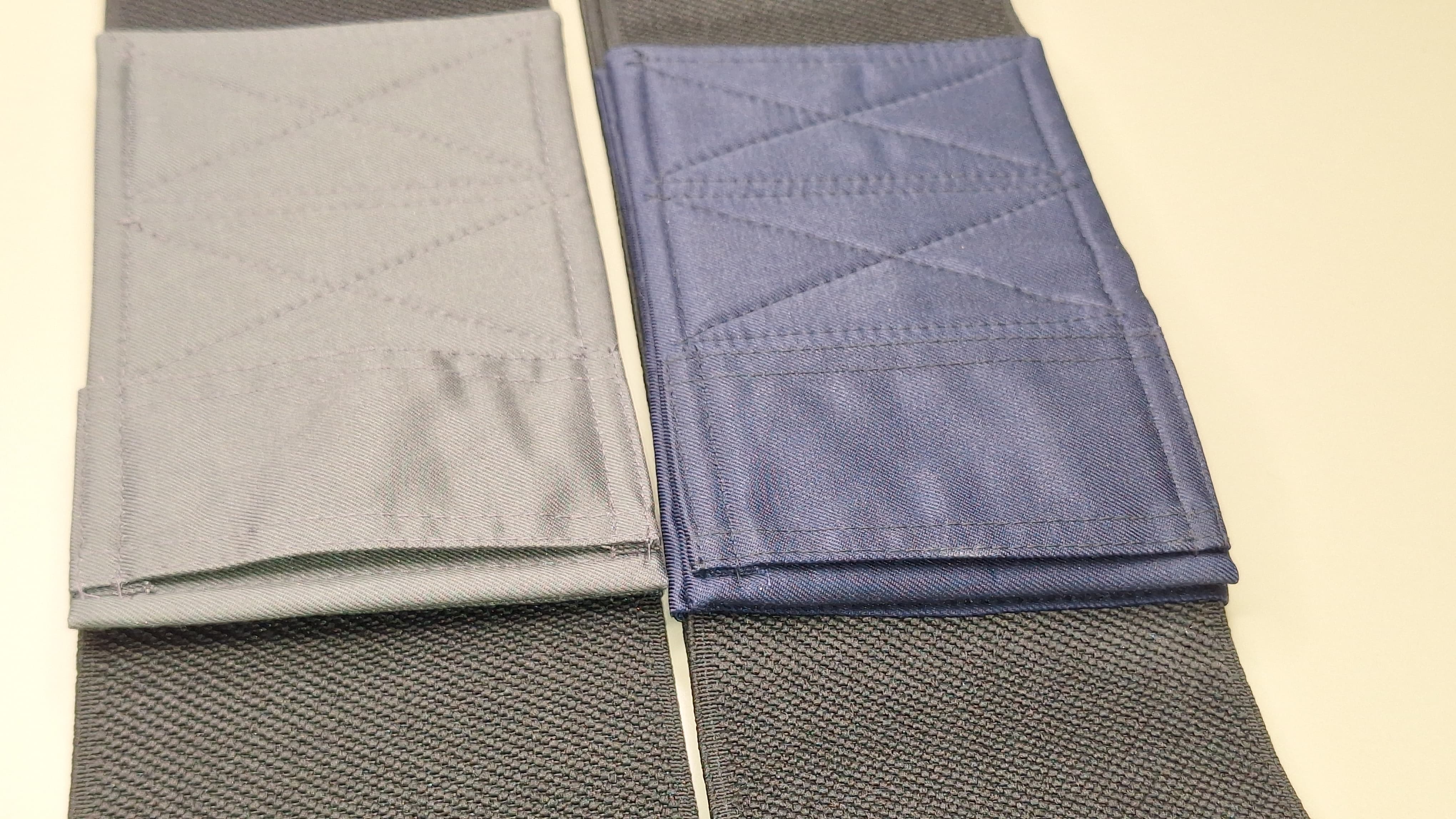 Wide elastic strap for keeping legs together for wheelchair users