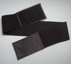 Wide elastic strap for keeping legs together for wheelchair users